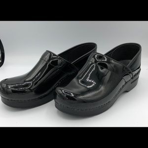 Dansko Patent Black Clogs